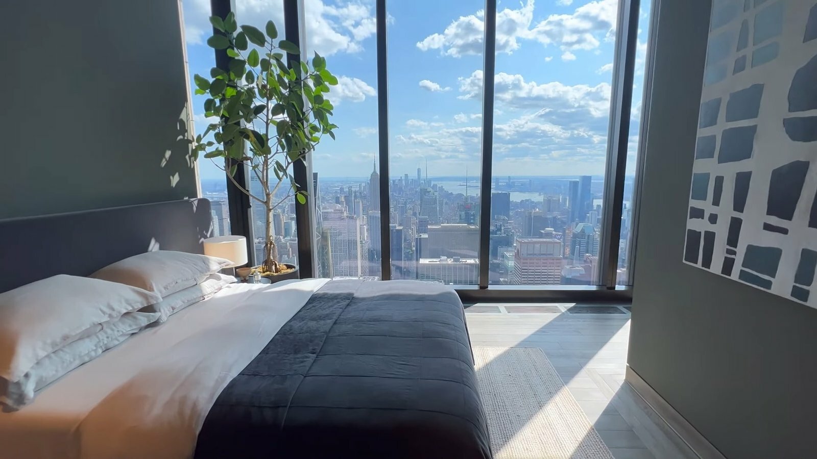 Bed Room Design with Long Glass Window Inside Billionaires Penthouse