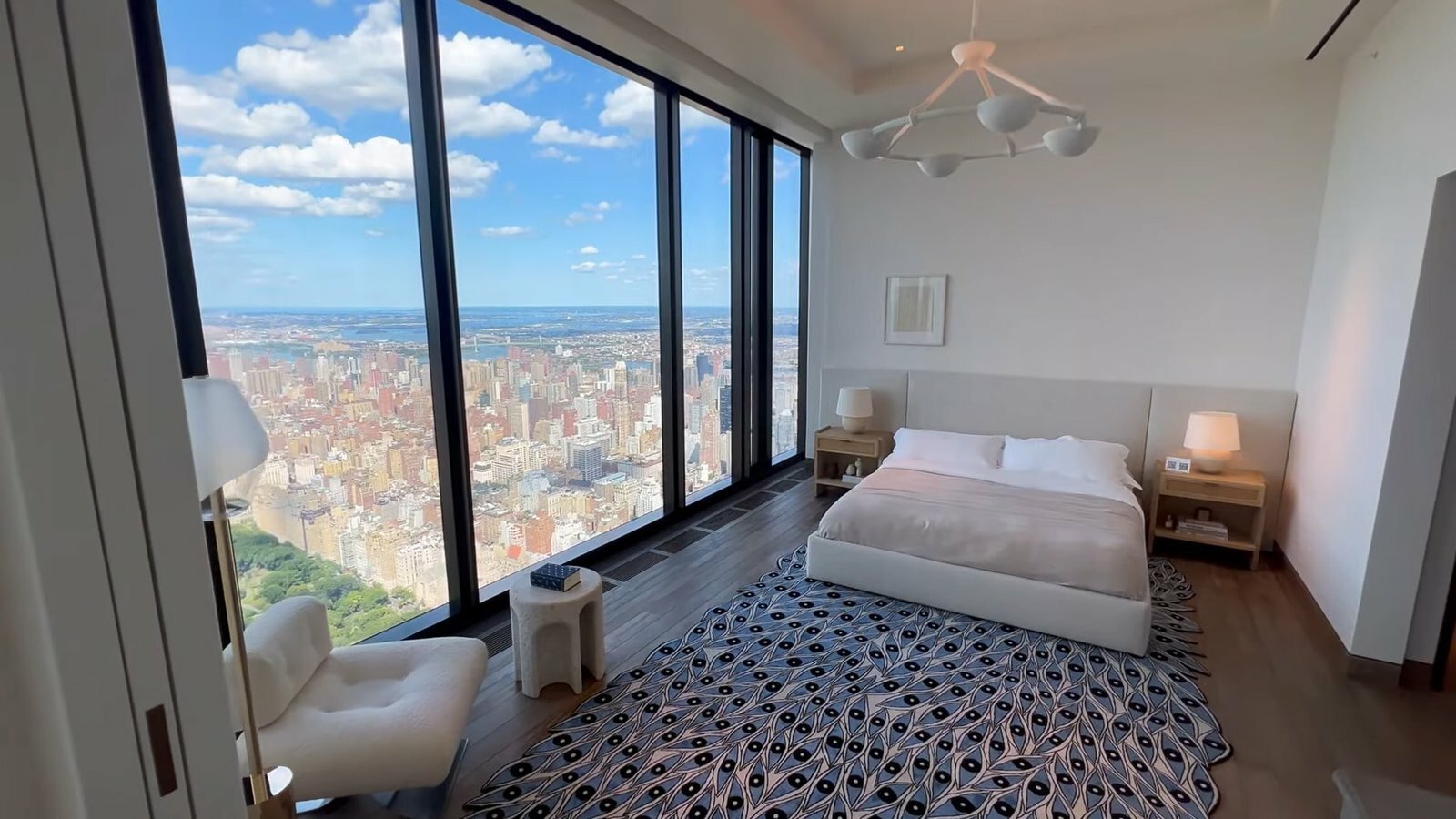 Fish Eye Carpet with White Bed & Window View Inside Billionaires Penthouse