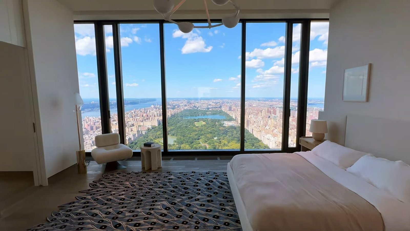 White Bed Inside Billionaires Penthouse